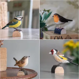 Image des différents modèles d'oiseaux en bois sculptés