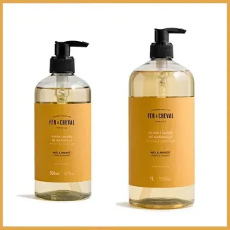 Image représentant deux bouteilles de savon liquide de parfum Miel Amande